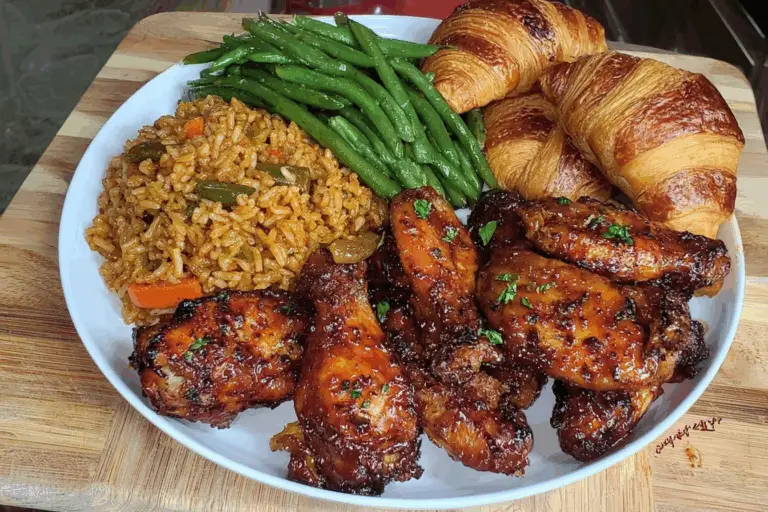Hennessy BBQ wings, dirty rice, green beans honey butter croissants