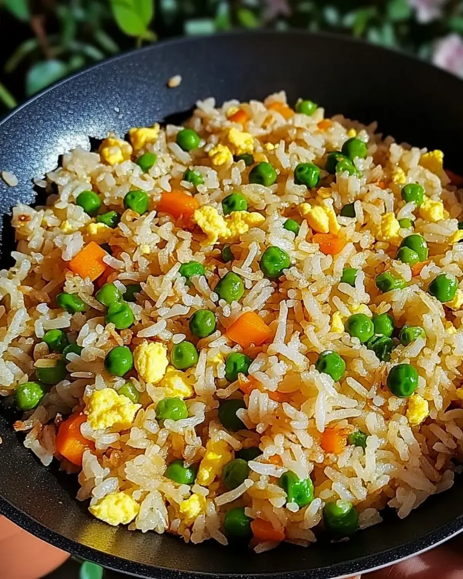 Delicious homemade fried rice cooking on a skillet