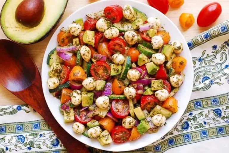 Tomato Cucumber Avocado Salad with Mozzarella and Basil Pesto
